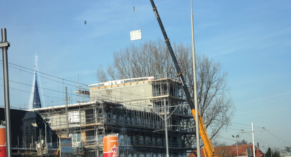 Kozijnen voor flat Stationsplein.